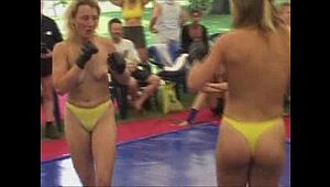 Topless women fight